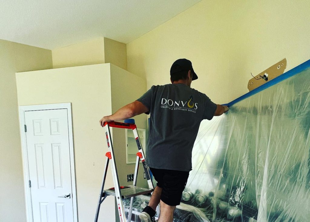 Don Vos employee doing handyman work